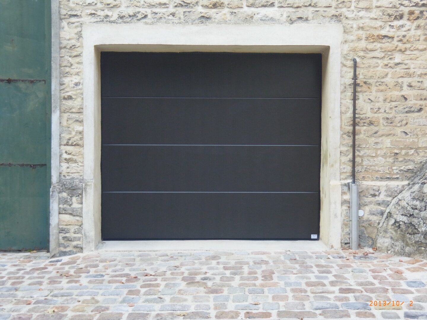 diapo5 Porte de garage sectionnelle noire